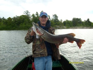 JOE CHAPMAN WITH HIS FIRST EVER PIKE 25lbs 10oz ON HIS FIRST TRIP TO DIAMOND KEY LODGE JUNE 14th 10:00 am 2009